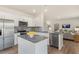 Kitchen with stainless steel appliances and granite island at 203 Calebs Corner Pl, Spring Lake, NC 28390