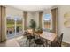 Bright dining area with sliding glass doors leading to patio at 203 Calebs Corner Pl, Spring Lake, NC 28390
