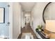 Long hallway with wood floors and stylish decor at 203 Calebs Corner Pl, Spring Lake, NC 28390