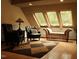 Relaxing sitting area with two armchairs and a chaise lounge at 568 Log Barn Rd, Pittsboro, NC 27312