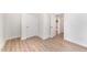 Bright bedroom with wood-look floors and access to a bathroom at 112 N Guthrie Ave # A, Durham, NC 27703