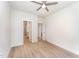 Spacious bedroom with wood-look floors and access to hallway bathroom at 112 N Guthrie Ave # A, Durham, NC 27703