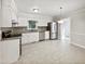 Bright kitchen with stainless steel appliances and granite countertops at 2504 Timothy Dr, Fuquay Varina, NC 27526