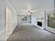 Living room with fireplace and neutral carpet at 2504 Timothy Dr, Fuquay Varina, NC 27526