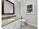 Updated bathroom with granite countertop and new fixtures at 2504 Timothy Dr, Fuquay Varina, NC 27526