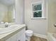 Clean bathroom with updated vanity and neutral colors at 2504 Timothy Dr, Fuquay Varina, NC 27526