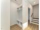 Entryway with built-in shelving and wooden stairs at 112 N Guthrie Ave # B, Durham, NC 27703