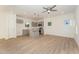 Modern kitchen with island, stainless steel appliances, and light grey cabinets at 112 N Guthrie Ave # B, Durham, NC 27703