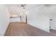 Open living room with hardwood floors and staircase at 112 N Guthrie Ave # C, Durham, NC 27703