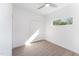 Spacious bedroom with hardwood floors and double doors to closet at 112 N Guthrie Ave # C, Durham, NC 27703