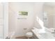 Clean bathroom, featuring a bathtub, toilet and vanity at 112 N Guthrie Ave, Durham, NC 27703