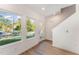 Bright entryway with hardwood floors and stairs at 112 N Guthrie Ave, Durham, NC 27703