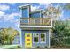 Two-story modern home with blue siding and yellow door at 112 N Guthrie Ave, Durham, NC 27703