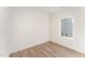 Spacious bedroom featuring hardwood floors and a window at 112 N Guthrie Ave, Durham, NC 27703