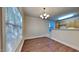 Bright dining room with hardwood floors and a chandelier at 1414 Arborgate Cir, Chapel Hill, NC 27514