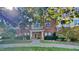 Brick building exterior with landscaping and walkway at 1414 Arborgate Cir, Chapel Hill, NC 27514