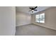 Bedroom with ceiling fan, carpeting, and a window with blinds at 1414 Arborgate Cir, Chapel Hill, NC 27514