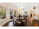 Bright breakfast nook with a charming table and chairs, offering views to the backyard at 2117 Blue Haven Ct, Wake Forest, NC 27587
