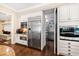 Modern kitchen with stainless steel appliances and ample cabinet space at 2117 Blue Haven Ct, Wake Forest, NC 27587