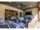 Spacious covered patio with comfortable seating and views of the backyard at 2117 Blue Haven Ct, Wake Forest, NC 27587