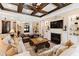 Living room features hardwood floors, a fireplace, and a coffered ceiling at 2117 Blue Haven Ct, Wake Forest, NC 27587