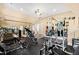 Spacious home gym featuring various exercise equipment and mirrors at 2117 Blue Haven Ct, Wake Forest, NC 27587