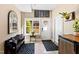 Inviting basement entry with a bench and ample natural light at 2117 Blue Haven Ct, Wake Forest, NC 27587