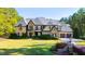 Grand two-story home with stone and shingle exterior at 2117 Blue Haven Ct, Wake Forest, NC 27587