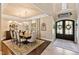 Formal dining room featuring a wood table and chandelier, near the entryway at 2117 Blue Haven Ct, Wake Forest, NC 27587