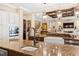 Kitchen island with a farmhouse sink and a modern gooseneck faucet at 2117 Blue Haven Ct, Wake Forest, NC 27587