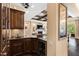 Convenient wet bar with a wine cooler and sink, perfect for entertaining at 2117 Blue Haven Ct, Wake Forest, NC 27587