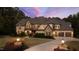 Luxury home exterior view at dusk at 2117 Blue Haven Ct, Wake Forest, NC 27587