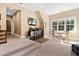 Spacious bonus room with seating area and large windows at 2117 Blue Haven Ct, Wake Forest, NC 27587