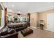 Relaxing sitting area with sectional sofa and popcorn machine at 2117 Blue Haven Ct, Wake Forest, NC 27587