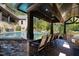 Outdoor pool bar with seating, offering stunning views at 2117 Blue Haven Ct, Wake Forest, NC 27587