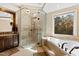 Spa-like bathroom with a large shower and soaking tub at 2117 Blue Haven Ct, Wake Forest, NC 27587