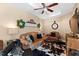 Cozy sitting room with leather furniture and a cowhide rug at 2117 Blue Haven Ct, Wake Forest, NC 27587
