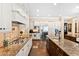 Modern kitchen with stainless steel appliances and white shaker cabinets at 2117 Blue Haven Ct, Wake Forest, NC 27587