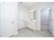 Bathroom with a vanity, toilet and access to a walk-in closet at 4953 Enlightenment Rd, Raleigh, NC 27616