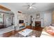 Cozy living room features hardwood floors, fireplace, and ample natural light at 113 Higbee St, Durham, NC 27704