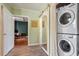 Convenient laundry room with a stackable washer and dryer and access to other rooms at 113 Higbee St, Durham, NC 27704