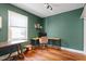 Spacious home office with wood floors and a window providing natural light at 113 Higbee St, Durham, NC 27704