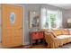 Living room features hardwood floors, a comfy couch, and large windows at 113 Higbee St, Durham, NC 27704