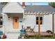 Inviting front porch with seating and lush landscaping at 113 Higbee St, Durham, NC 27704