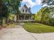 Charming craftsman home with a welcoming front porch and landscaped yard at 3108 Agecroft Rd, Raleigh, NC 27608