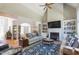 Open living room with hardwood floors and built-in shelves at 512 W Franklin St, Zebulon, NC 27597