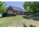 Brick house with a screened porch and spacious backyard at 512 W Franklin St, Zebulon, NC 27597
