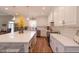 Modern kitchen with white cabinets and large island at 512 W Franklin St, Zebulon, NC 27597