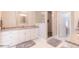 Elegant bathroom with granite countertops and large shower at 512 W Franklin St, Zebulon, NC 27597