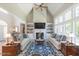 Bright living room with hardwood floors and high ceilings at 512 W Franklin St, Zebulon, NC 27597